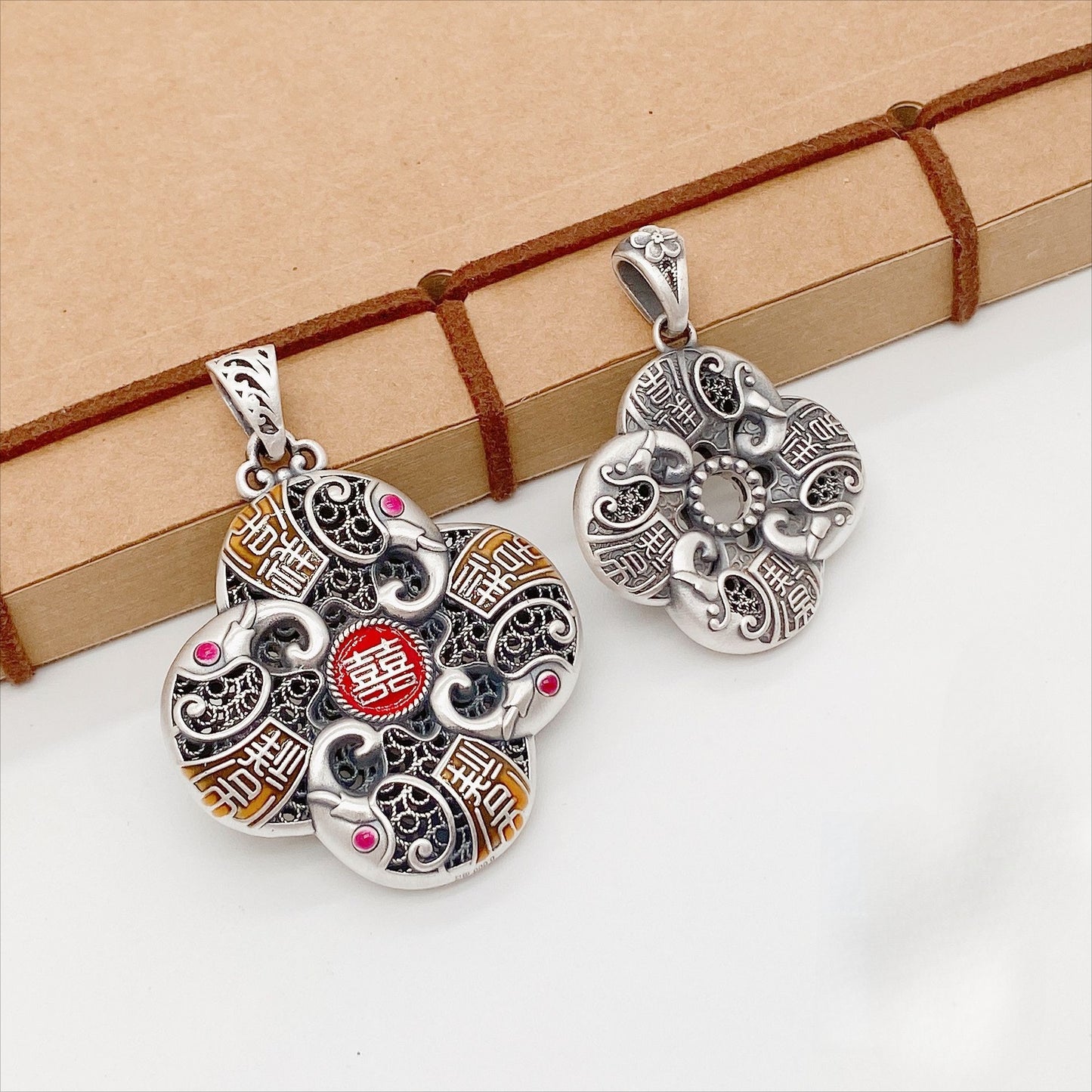 Auspicious sterling silver pendant