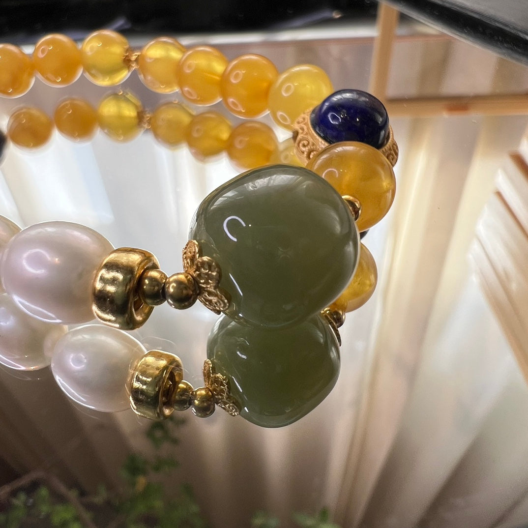 Chinese mandarin duck pearl beeswax bracelet