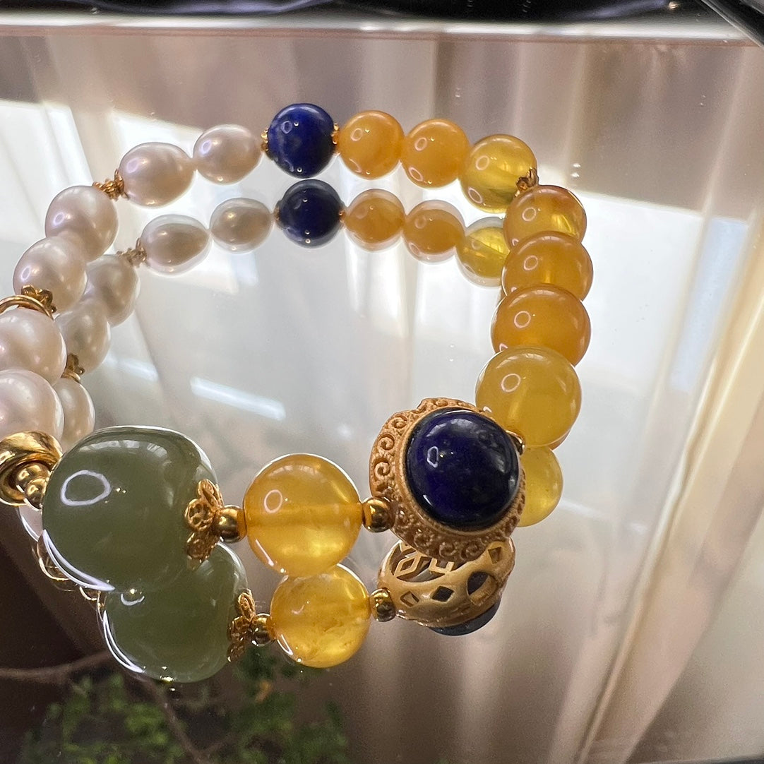 Chinese mandarin duck pearl beeswax bracelet