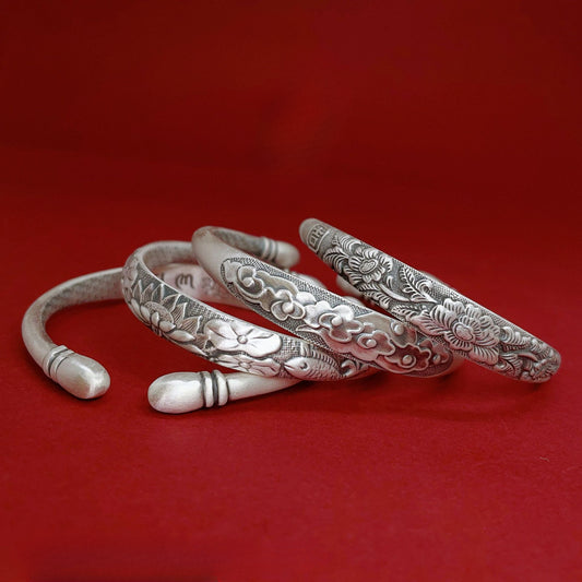 Ethnic floral relief sterling silver bracelet