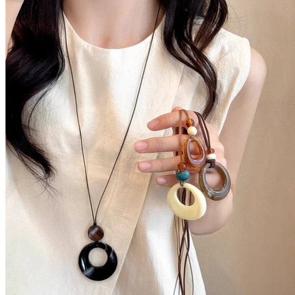 High-end ring pendant black rope long necklace