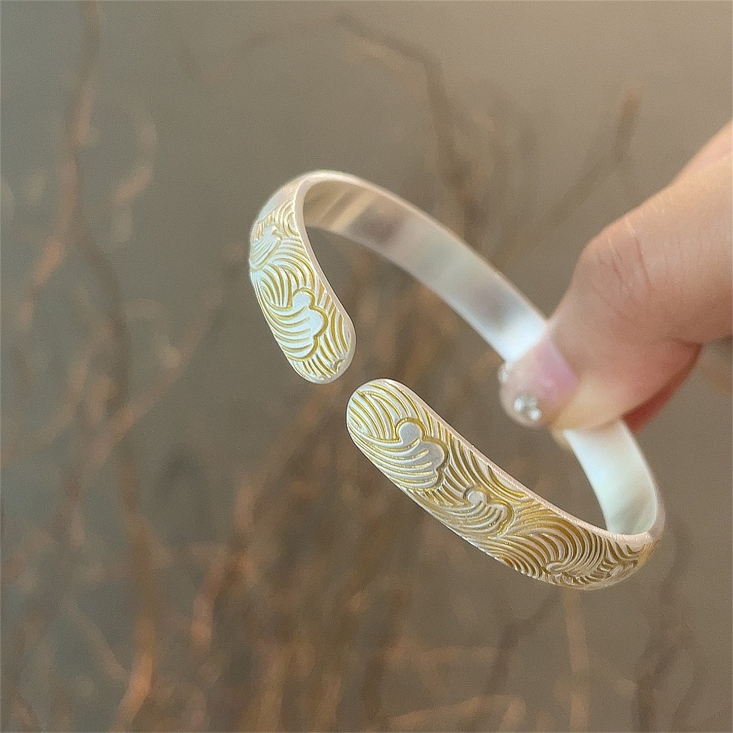 Gold-painted 8m wave-like sterling silver bracelet