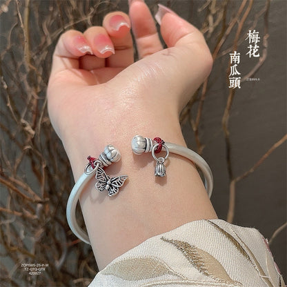 China Plum blossom and butterfly bell sterling silver bracelet