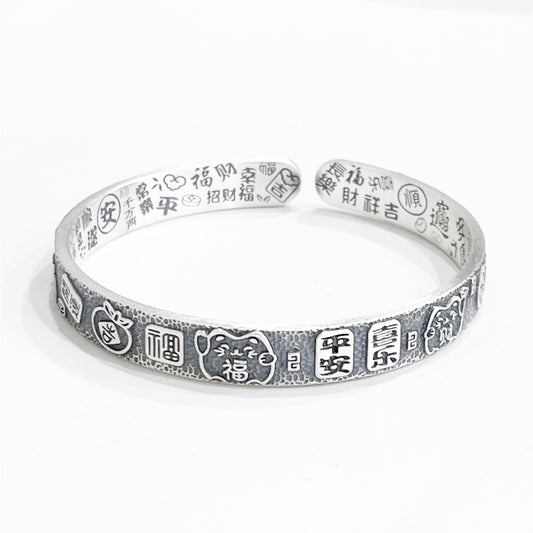 Chinese style peace and joy sterling silver bracelet