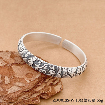 Chinese relief carp sterling silver bracelet