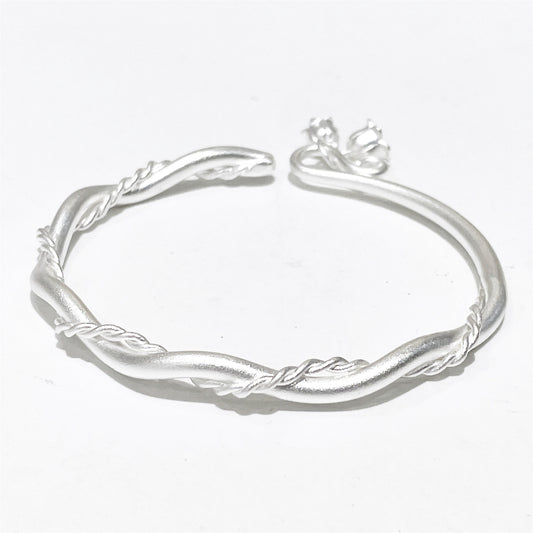 Chinese style twisted flower pendant sterling silver bracelet