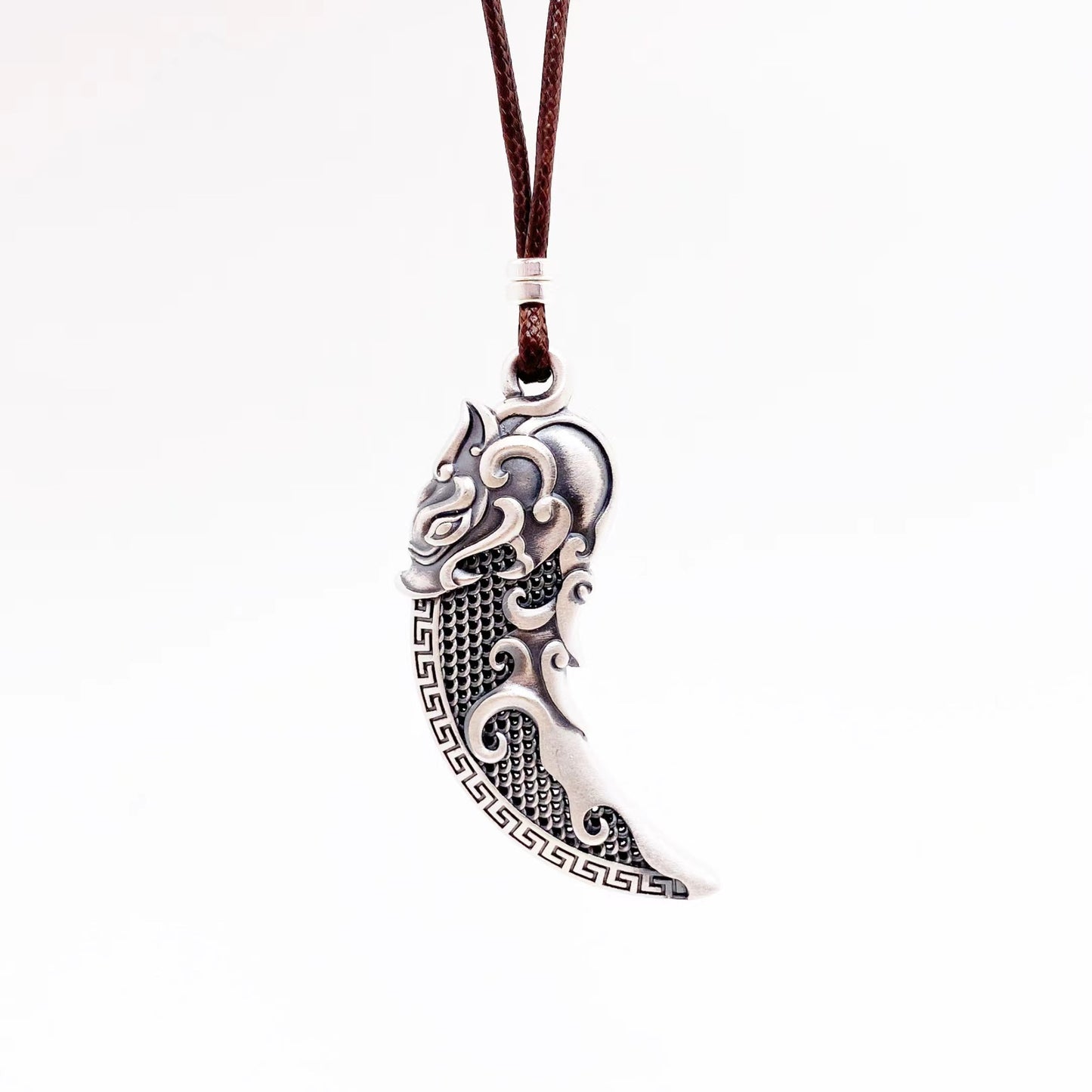 Filigree wolf tooth sterling silver pendant necklace