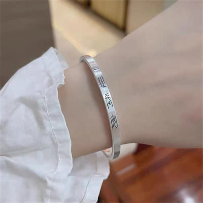 Chinese style peace and joy sterling silver bracelet