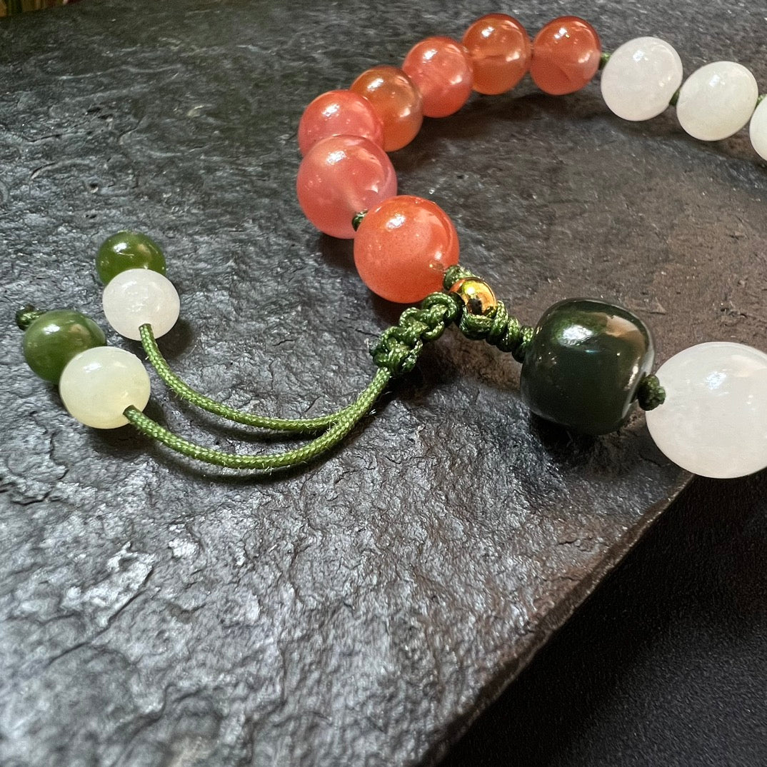 Hetian jade Nanhong braided rope bracelet