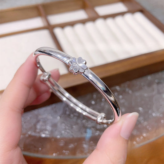 Polished four-leaf clover sterling silver bracelet