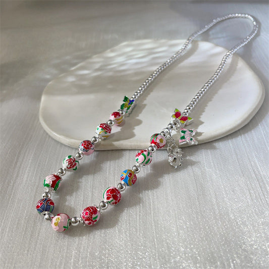 Colorful butterfly lily of the valley beaded necklace