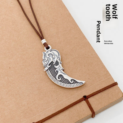 Filigree wolf tooth sterling silver pendant necklace