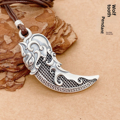 Filigree wolf tooth sterling silver pendant necklace